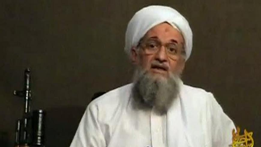 EDITOR'S NOTE: REUTERS IS UNABLE TO INDEPENDENTLY VERIFY THE CONTENT OF THE VIDEO FROM WHICH THIS STILL IMAGE WAS TAKEN. 
Al Qaeda's second-in-command Ayman al-Zawahri speaks from an unknown location, in this still image taken from video uploaded on a social media website June 8, 2011. Osama bin Laden's longtime lieutenant, Ayman al-Zawahri, said the United States faces rebellion throughout the Muslim world after killing the al Qaeda leader, according to a 28-minute YouTube recording posted on Wednesday. I