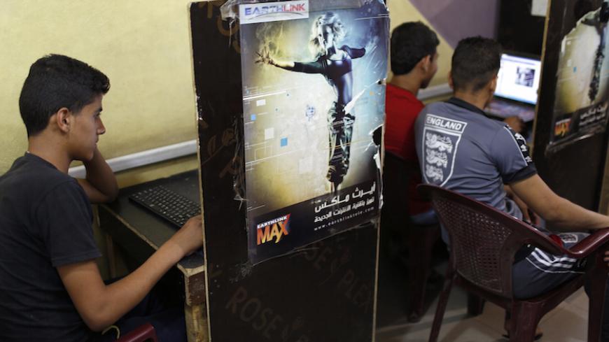 Iraqi Shi'ite youths use computers at an internet cafe in Sadr City in Baghdad May 3, 2014. Iraq is now gripped by its worst violence since the heights of its 2005-2008 sectarian war, and Sunni Islamist insurgents who target Shi'ites have been regaining ground in the country over the past year. But despite the instability, daily life continues in poor Shi'ite neighbourhoods of Baghdad such as Al-Fdhiliya and Sadr City - a sprawling slum marred by poor infrastructure and overcrowding. Picture taken May 3, 20