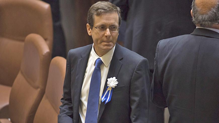 Isaac Herzog, leader of Zionist Union party, attends the swearing-in ceremony of the 20th Knesset, the new Israeli parliament, in Jerusalem March 31, 2015. REUTERS/Heidi Levine/Pool - RTR4VMRF