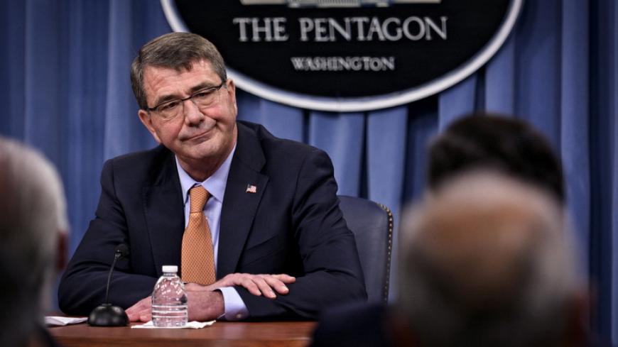 U.S. Secretary of Defense Ashton Carter and Chairman of the Joint Chiefs General Martin Dempsey (not pictured) speak to reporters at the Pentagon in Washington April 16, 2015. REUTERS/James Lawler Duggan - RTR4XNHW