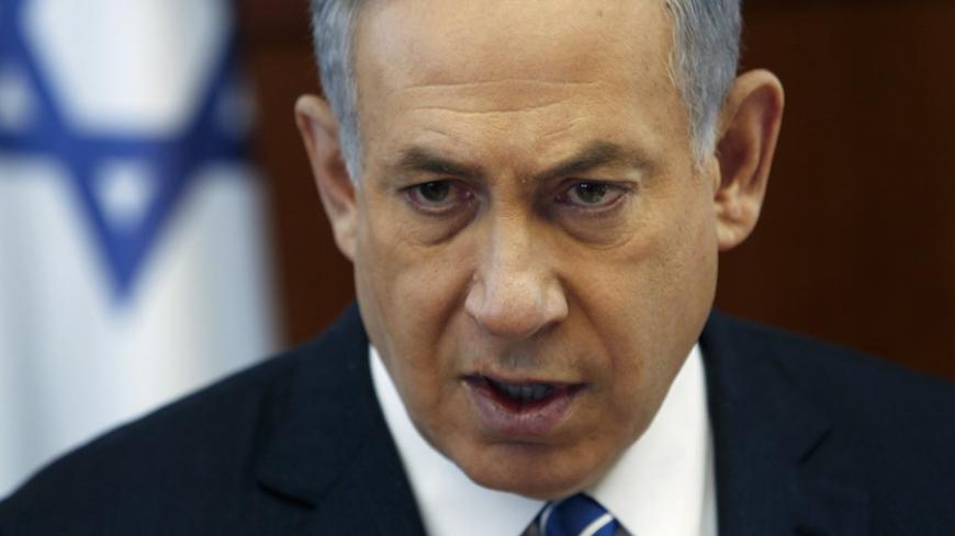 Israel's Prime Minister Benjamin Netanyahu attends a cabinet meeting at his office in Jerusalem May 26, 2015. Netanyahu has proposed resuming peace negotiations with the Palestinians but with the initial focus on identifying those Jewish settlements that Israel would keep and be allowed to expand, an Israeli official said on Tuesday. REUTERS/Ronen Zvulun  - RTX1EKJI