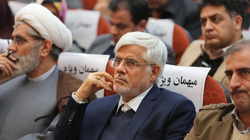 Iranian former Vice-President Mohammad Reza Aref (C), attends the reformist Islamic Iran Participation Front (IIPF) party meeting  in Tehran on January 15,2015. Iranian reformers gathered in Tehran, the first since 2009, with the ambition to return parliament to conservative control in the 2016 parliamentary elections, taking advantage of the momentum that carried Hassan Rohani to president in 2013. AFP PHOTO/ ATTA KENARE        (Photo credit should read ATTA KENARE/AFP/Getty Images)