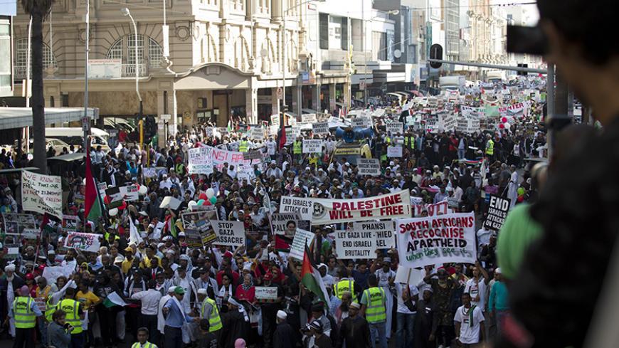 Pro-Palestinian demonstrators protest against Israel's military action in Gaza, after Friday prayers in Durban July 25, 2014. REUTERS/Rogan Ward (SOUTH AFRICA - Tags: POLITICS CIVIL UNREST) - RTR404V5