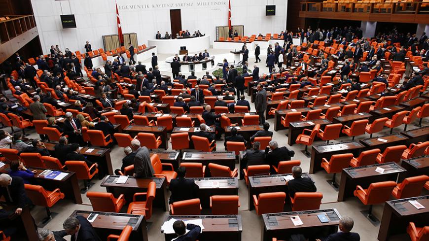 Turkish Parliament convene for a debate in Ankara January 20, 2015. Parliament was to vote on Tuesday on whether to commit four former ministers for trial over the corruption allegations. REUTERS/Umit Bektas (TURKEY - Tags: POLITICS CRIME LAW) - RTR4M7DM