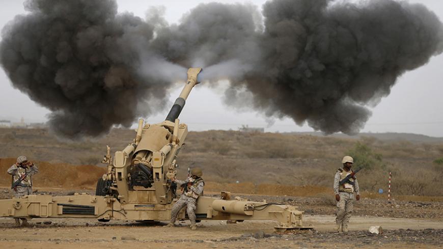 Saudi army artillery fire shells towards Houthi positions from the Saudi border with Yemen April 13, 2015. REUTERS/Faisal Al Nasser      TPX IMAGES OF THE DAY      - RTR4X67W