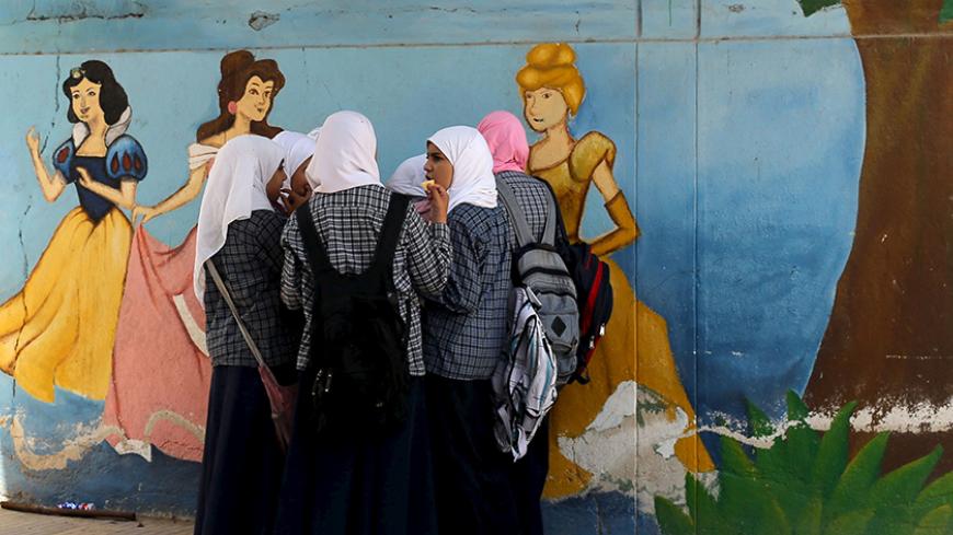 Students talk after finishing an exam in one of the Al-Azhar institutes in Cairo, Egypt, May 20, 2015. Picture taken May 20, 2015.    To match Special Report EGYPT-ISLAM/AZHAR    REUTERS/Asmaa Waguih  - RTR4Y753