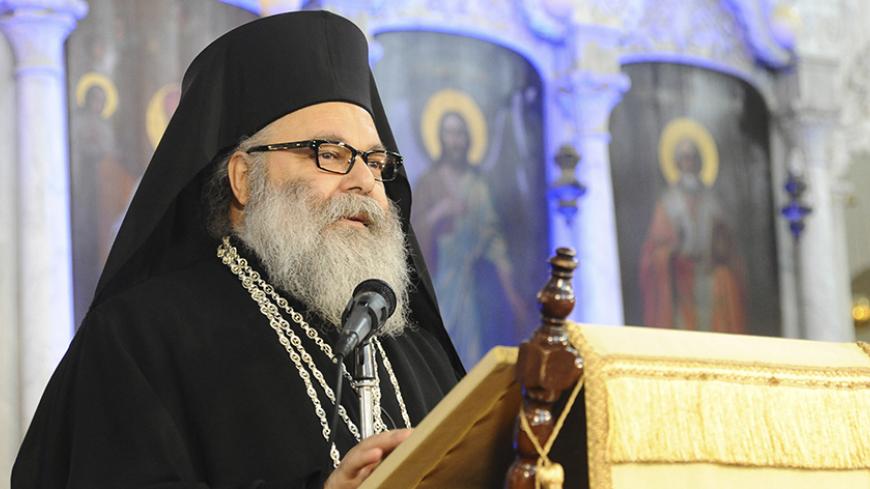 Patriarch John X Yazigi, Greek Orthodox Patriarch of Antioch and All the East, delivers a speech at a ceremony to pray for peace in a country plagued by two and a half years of war, during a Christmas mass at al-Maryamyeh church in Damascus December 25, 2013, in this handout photograph released by Syria's national news agency SANA. REUTERS/SANA/Handout via Reuters (SYRIA - Tags: POLITICS RELIGION ANNIVERSARY) ATTENTION EDITORS – THIS IMAGE WAS PROVIDED BY A THIRD PARTY. FOR EDITORIAL USE ONLY. NOT FOR SALE 