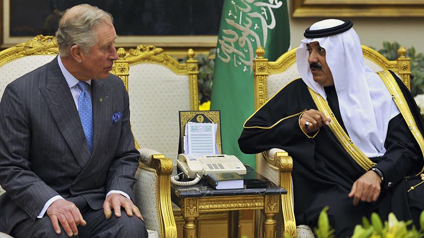 Saudi National Guard Minister Mutaib bin Abdullah bin Abdulaziz (R) meets Britain's Prince Charles in Riyadh February 17, 2014.  REUTERS/Fayez Nureldine/Pool (SAUDI ARABIA - Tags: POLITICS ROYALS) - RTX190B1