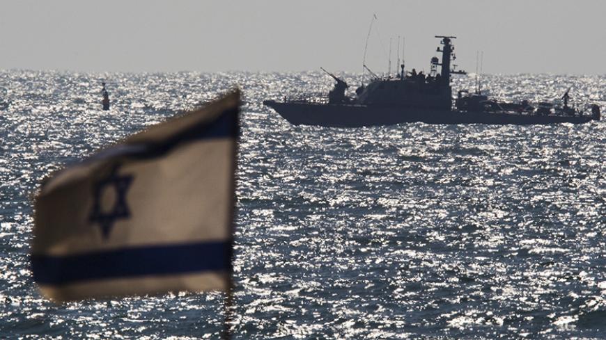 An Israeli naval vessel is seen in the Mediterranean sea outside the port of Ashdod, Israel June 29, 2015. Israel said on Monday it had blocked a boat leading a four-vessel protest flotilla of foreign activists from reaching the Gaza Strip and forced the vessel to sail to the Israeli port. REUTERS/Amir Cohen - RTX1I9PS