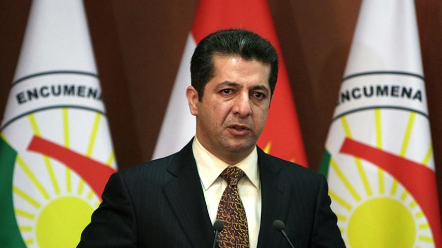 Masrour Barzani, Chancellor of the Kurdistan Region Security Council, speaks during a press conference on October 12, 2013. Tight security measures imposed after a rare deadly attack in Iraq's autonomous Kurdistan region have curbed tourism ahead of the year's biggest Muslim holiday, industry officials and business owners say. AFP PHOTO / SAFIN HAMED        (Photo credit should read SAFIN HAMED/AFP/Getty Images)