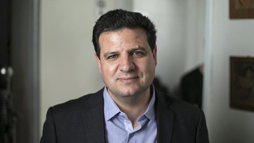 Ayman Odeh, head of the Joint Arab List, poses before the filming of a television campaign ad in Tel Aviv, March 8, 2015. A political sideshow for much of the past six decades, Israel's Arab minority is hoping to gain much-needed muscle after next week's parliamentary election, with four Arab parties uniting under one banner for the first time. Surveys show the Joint Arab List could even finish third in the vote and become a factor in the coalition-building that dominates Israeli politics, where no party ha