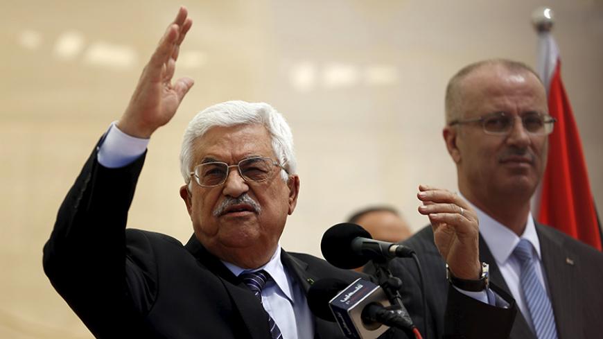 Palestinian President Mahmoud Abbas gestures as he speaks during the opening ceremony of a park in the West Bank city of Ramallah April 5, 2015. REUTERS/Mohamad Torokman - RTR4W5UM