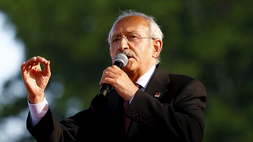Turkey's main opposition Republican People's Party (CHP) leader Kemal Kilicdaroglu addresses his supporters during an election rally for Turkey's June 7 parliamentary election, in Ankara, Turkey, May 31, 2015. REUTERS/Umit Bektas  - RTR4Y93D