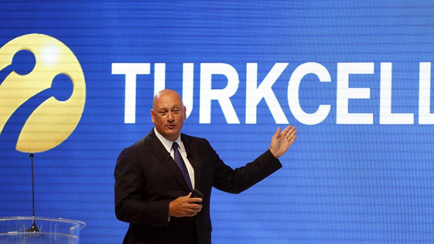 Turkcell Chief Executive Sureyya Ciliv speaks during a news conference to present the T40 smart phone, the company's new product, in Istanbul August 20, 2013. The T40 will be available to customers at the end of September. Turkcell is the leading mobile phone operator in Turkey. REUTERS/Murad Sezer (TURKEY - Tags: BUSINESS TELECOMS LOGO) - RTX12RDM
