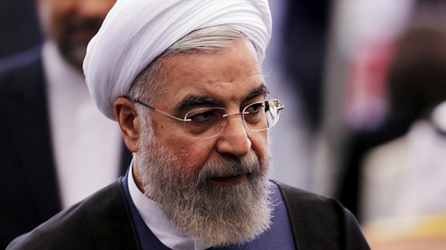 Iranian President Hassan Rouhani leaves after delivering a speech at plenary session during the Asian African Conference in Jakarta April 22, 2015. The 60th Asian-African Conference is held in Jakarta and Bandung from April 19 to 24, 2015. REUTERS/Beawiharta - RTX19RI1