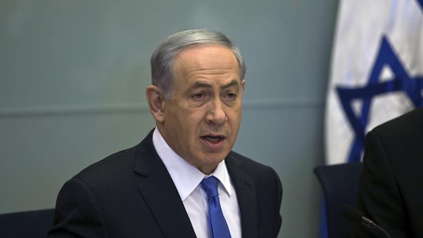 Israel's Prime Minister Benjamin Netanyahu attends a Foreign Affairs and Defence committee meeting at the parliament in Jerusalem June 29, 2015. Israel's security cabinet has approved extending the fortified fence along its Egyptian border to the frontier with neighbouring Jordan, Netanyahu said on Monday. REUTERS/Ronen Zvulun  - RTX1I84I