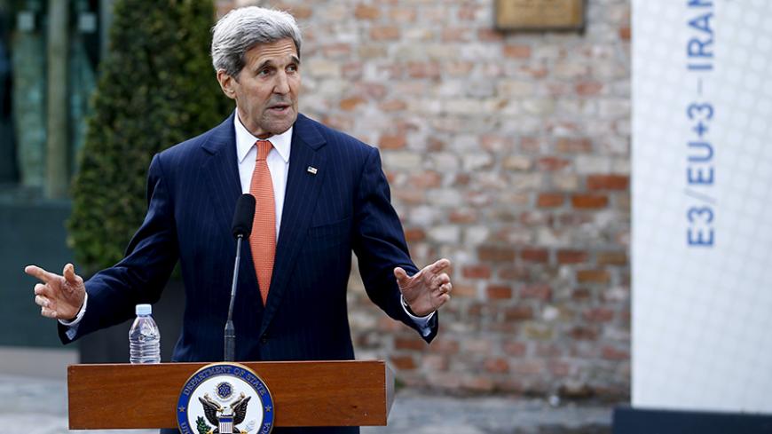 U.S. Secretary of State John Kerry talks to journalists in front of Palais Coburg, the hotel where the Iran nuclear talks meetings are being held in Vienna, Austria July 9, 2015. The United States and other major powers are not in a rush reach a nuclear agreement with Iran, though Washington and its partners will not negotiate with Tehran indefinitely, Kerry said on Thursday.   REUTERS/Leonhard Foeger - RTX1JS36