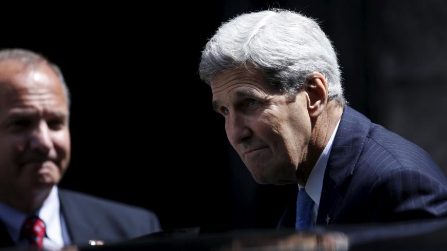 U.S. Secretary of State John Kerry leaves Stephen's Cathedral after attending a mass in Vienna, Austria July 12, 2015. A nuclear deal between Iran and major powers was within reach on Sunday, a senior Iranian official said, adding that some issues remained that needed to be resolved by foreign ministers. REUTERS/Carlos Barria  - RTX1K29F