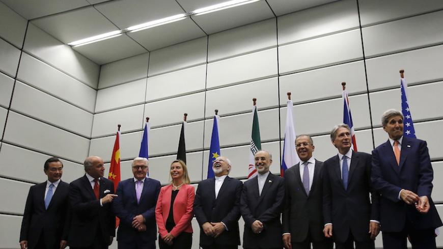 (From L to R) Chinese Foreign Minister Wang Yi, French Foreign Minister Laurent Fabius, German Foreign Minister Frank Walter Steinmeier, European Union High Representative for Foreign Affairs and Security Policy Federica Mogherini, Iranian Foreign Minister Mohammad Javad Zarif, Head of the Iranian Atomic Energy Organization Ali Akbar Salehi, Russian Foreign Minister Sergey Lavrov, British Foreign Secretary Philip Hammond and U.S. Secretary of State John Kerry pose for a group picture at the United Nations b