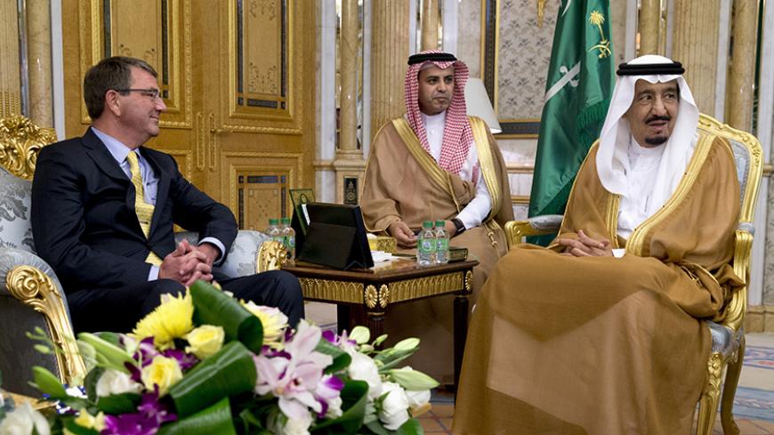 U.S. Defense Secretary Ash Carter meets with Saudi Arabia's King Salman bin Abdul Aziz (R) at Al-Salam Palace in Jeddah, Saudi Arabia, Wednesday, July 22, 2015. Carter flew into Saudi Arabia for meetings on Wednesday with King Salman and his security leadership to reassure the kingdom of America's support after Washington struck a nuclear deal with its arch-rival Iran. REUTERS/Carolyn Kaster/Pool - RTX1LBXR
