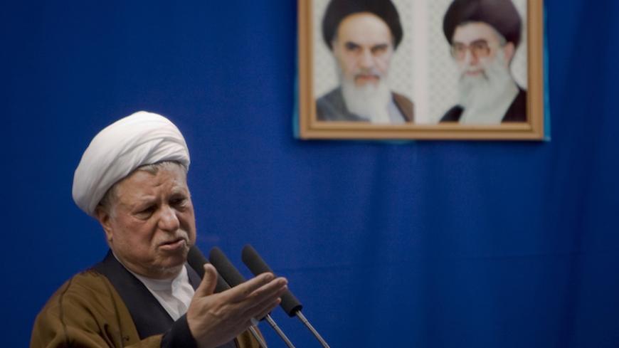 Iran's former president Ali Akbar Hashemi Rafsanjani delivers his speech during Friday prayers in Tehran April 24, 2009. Rafsanjani urged the United States on Friday to stop threatening Iran with more sanctions if it wanted to hold talks with the Islamic state over its disputed nuclear work.  REUTERS/Morteza Nikoubazl (IRAN RELIGION POLITICS) - RTXEBPS