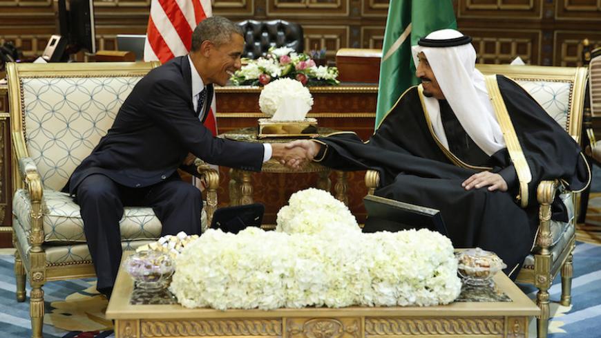 U.S. President Barack Obama (L) shakes hands with Saudi Arabia's King Salman at the start of a bilateral meeting at Erga Palace in Riyadh January 27, 2015. Obama sought to cement ties with Saudi Arabia as he came to pay his respects on Tuesday after the death of King Abdullah, a trip that underscores the importance of a U.S.-Saudi alliance that extends beyond oil interests to regional security. REUTERS/Jim Bourg (SAUDI ARABIA - Tags: POLITICS TPX IMAGES OF THE DAY) - RTR4N5LG