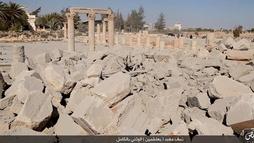 An image distributed by Islamic State militants on social media on August 25, 2015 purports to show the destruction of a Roman-era temple in the ancient Syrian city of Palmyra. Syria's antiquities chief Maamoun Abdulkarim told Reuters the images did appear to show the destruction of the ancient Baal Shamin temple and correlated with descriptions given by residents of the explosion detonated there on Sunday. Five photos were distributed on social media showing explosives being carried inside, being planted a