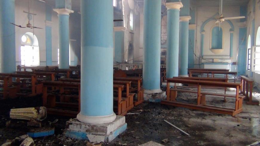 A general view shows destruction inside the Roman Catholic church of St Joseph in Yemen's second city of Aden after unidentified assailants set ablaze to the church on September 16, 2015 a day after it had been damaged by vandals. The masked arsonists torched the church in the central Crater neighbourhood of the port city, which is controlled by loyalists of the exiled government. AFP PHOTO / STR        (Photo credit should read STR/AFP/Getty Images)