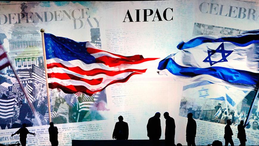 Workers prepare the stage at the American Israel Public Affairs Committee (AIPAC) policy conference in Washington, March 2, 2015. The United States and Israel showed signs of seeking to defuse tensions on Sunday ahead of a speech in Washington by Israeli Prime Minister Benjamin Netanyahu when he will warn against a possible nuclear deal with Iran.  REUTERS/Jonathan Ernst    (UNITED STATES - Tags: POLITICS CIVIL UNREST TPX IMAGES OF THE DAY) - RTR4RQVP