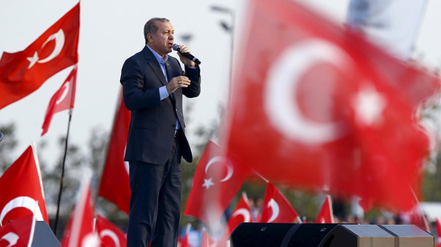 Turkey's President Tayyip Erdogan makes his speech during a rally against recent Kurdish militant attacks on Turkish security forces in Istanbul, Turkey, September 20, 2015. Turkish President Tayyip Erdogan and Prime Minister Ahmet Davutoglu attended the rally with the slogan "millions of people with a single voice against terror" at central Istanbul. REUTERS/Murad Sezer  TPX IMAGES OF THE DAY      - RTS20OA