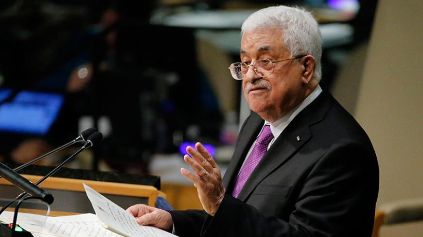 Palestinian President Mahmoud Abbas addresses attendees during the 70th session of the United Nations General Assembly at the U.N. headquarters in New York, September 30, 2015.     REUTERS/Carlo Allegri - RTS2GK8