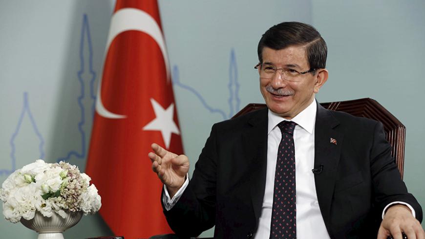 Turkish Prime Minister Ahmet Davutoglu talks during an interview with Reuters in Istanbul, Turkey, October 14, 2015. Davutoglu told Reuters on Wednesday some of the suspects in a suicide bombing that killed 97 people in Ankara had spent months in Syria and that they could be linked to Islamic State or to Kurdish militants. "We are working on (investigating) two terrorist organisations, Daesh (Islamic State) and PKK, because we have certain evidence regarding the suicide bombers having links with Daesh, but 