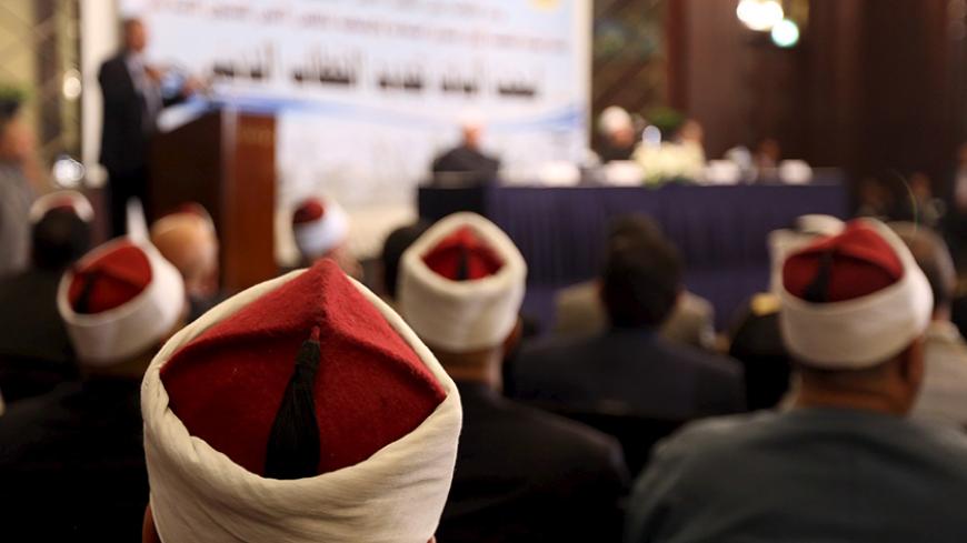 Muslim scholars attend a conference held by the Awqaf (Religious Affairs) Ministry headquarters in Cairo, May 25, 2015, to discuss the renewal of religious discourse, a proposal by President Abdel Fattah al-Sisi in hopes to confront the extremism that has swept the region in recent years. REUTERS/Mohamed Abd El Ghany - RTX1EH37
