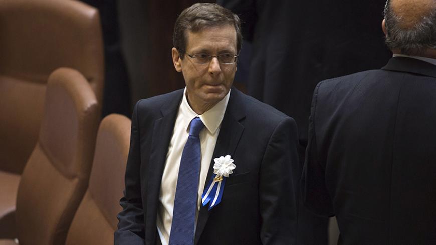 Isaac Herzog, leader of Zionist Union party, attends the swearing-in ceremony of the 20th Knesset, the new Israeli parliament, in Jerusalem March 31, 2015. REUTERS/Heidi Levine/Pool - RTR4VMRF