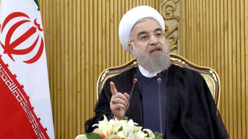 Iranian President Hassan Rouhani speaks after returning from the annual United Nations General Assembly, in Tehran September 29, 2015. REUTERS/Raheb Homavandi/TIMAATTENTION EDITORS - THIS PICTURE WAS PROVIDED BY A THIRD PARTY. REUTERS IS UNABLE TO INDEPENDENTLY VERIFY THE AUTHENTICITY, CONTENT, LOCATION OR DATE OF THIS IMAGE. FOR EDITORIAL USE ONLY. NOT FOR SALE FOR MARKETING OR ADVERTISING CAMPAIGNS. NO THIRD PARTY SALES. NOT FOR USE BY REUTERS THIRD PARTY DISTRIBUTORS. THIS PICTURE IS DISTRIBUTED EXACTLY 