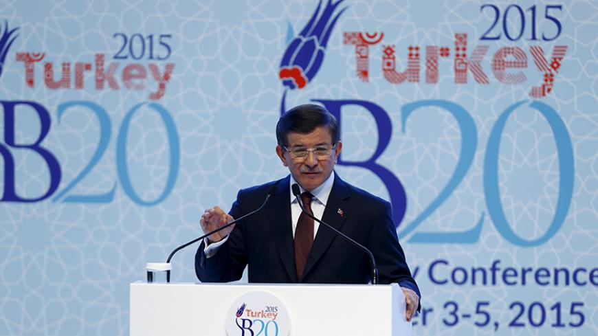 Turkey's Prime Minister Ahmet Davutoglu addresses the audience during a conference in Ankara, Turkey, September 4, 2015.  Davutoglu said on Friday a new perspective was needed to achieve global growth given dwindling dynamism in emerging market countries.   REUTERS/Umit Bektas - RTX1R2CK
