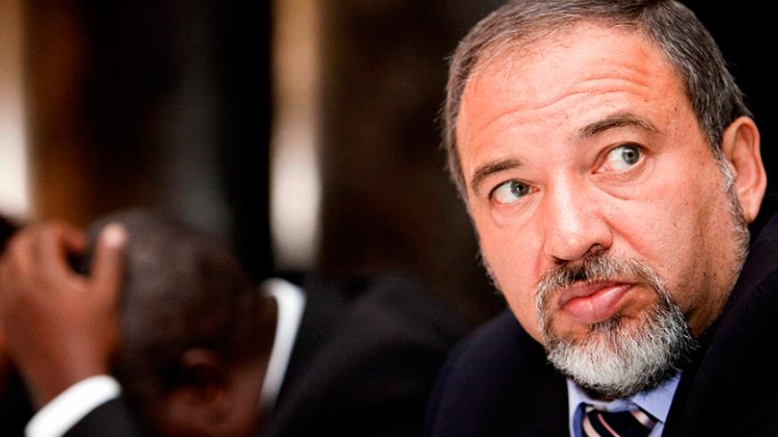 Israel's Foreign Minister Avigdor Liberman attends a meeting with the business community in Uganda's capital Kampala, September 10, 2009. Lieberman, accompanied by business and military delegation, is on an official African visit to Ethiopia, Kenya, Ghana, Uganda, and Nigeria. REUTERS/James Akena (UGANDA POLITICS BUSINESS) - RTR27O1U