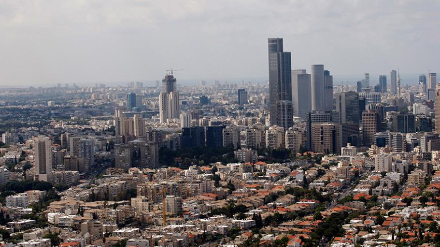 An aerial view shows Tel Aviv's skyline September 23, 2009. REUTERS/Gil Cohen Magen (ISRAEL CITYSCAPE SOCIETY) - RTR286D8