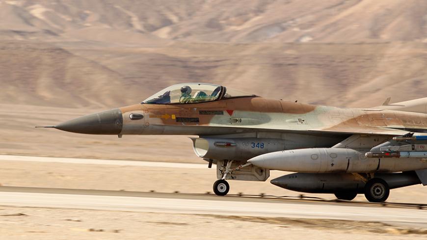 An Israeli F-16 fighter jet takes off from Ovda airbase, some 40 km (25 miles) north of Eilat, during the Blue Flag drill November 25, 2013. The Blue Flag drill is a two-week multilateral air force drill with air forces of Israel, the United States, Greece and Italy. REUTERS/Amir Cohen (ISRAEL - Tags: TRANSPORT MILITARY) - RTX15W65