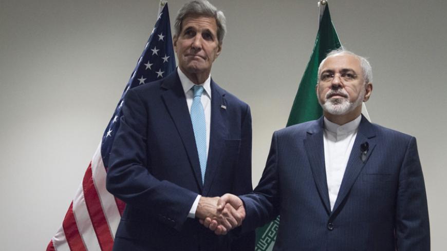 United States Secretary of State John Kerry (L) meets with Mohammad Javad Zarif,  Minister of Foreign Affairs of Iran, at the United Nations in New York, September 26, 2015. REUTERS/Stephanie Keith      TPX IMAGES OF THE DAY      - RTX1SNOV