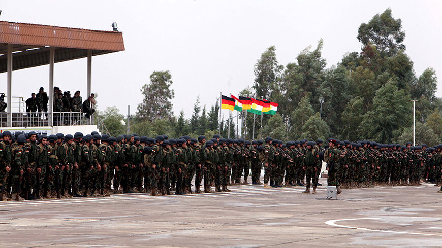 Kurdish peshmerga take part in a training session during German Defence Minister Ursula von der Leyen's visit at a camp in Banslawa in Arbil, north of Baghdad, October 27, 2015. German Defence Minister Ursula von der Leyen said that the government will look into sending more weapons to Peshmerga fighting Islamic State in Iraq. Von der Leyen has been in Iraq since late, she also paid a visit to a camp in Banslawa where German soldiers are currently training around 30 young Kurdish fighters. REUTERS/Azad lash