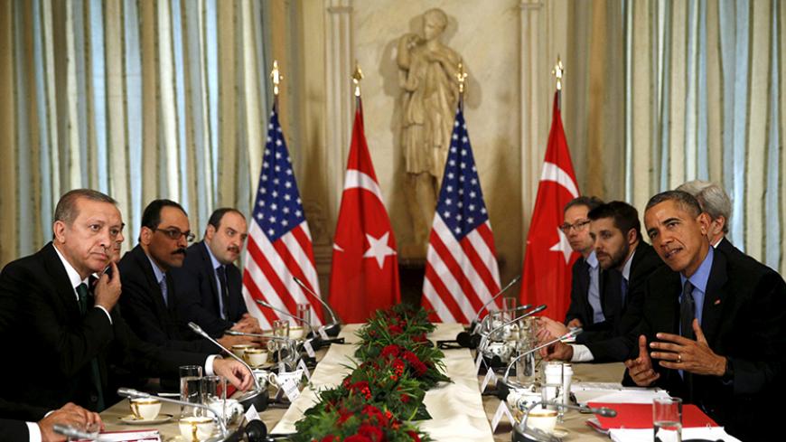 U.S. President Barack Obama meets with Turkish President Recep Tayyip Erdogan (L) at the U.S. ambassador's residence during the World Climate Change Conference 2015 (COP21) in Paris, France December 1, 2015. Obama urged Turkey on Tuesday to reduce tensions with Moscow after the downing of a Russian warplane and to seal its border with Syria to choke off the supply of money and fighters to Islamic State militants. REUTERS/Kevin Lamarque  - RTX1WOVR