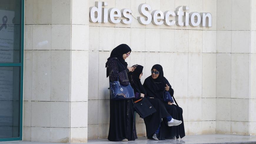 Women rest after casting their votes at a polling station during municipal elections, in Riyadh, Saudi Arabia December 12, 2015. REUTERS/Faisal Al Nasser - RTX1YCC4