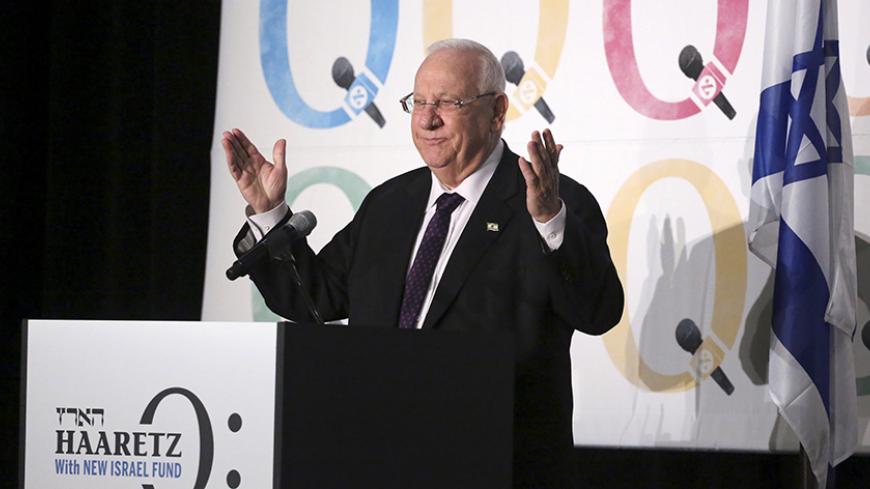 Israeli President Reuven Rivlin addresses attendees at the "Haaretz Q: with New Israel Fund" event at The Roosevelt Hotel in the Manhattan borough of New York City, December 13, 2015. REUTERS/Andrew Kelly - RTX1YHSZ