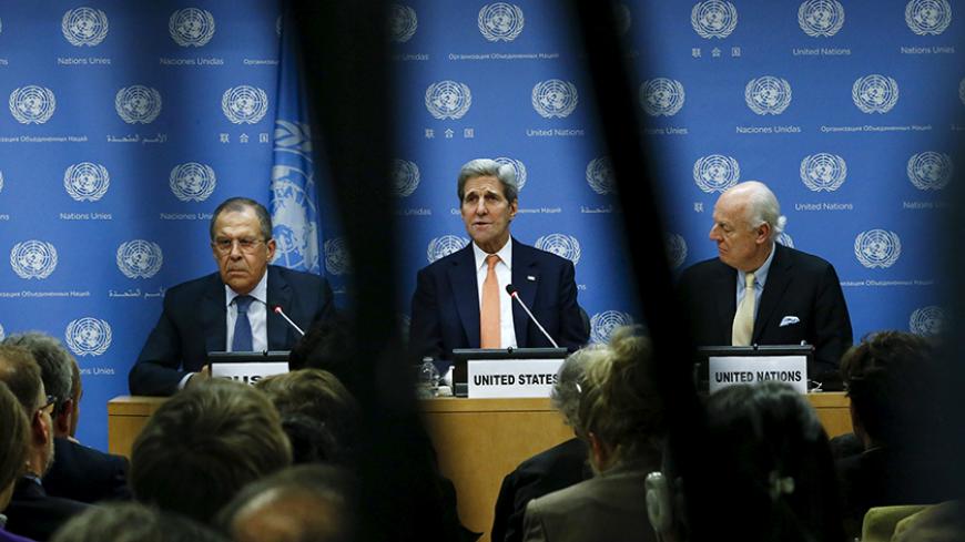 U.S. Secretary of State John Kerry (C) speaks to the media next to Russia's Foreign Minister Sergey Lavrov (L) and Special Envoy of the Secretary-General for Syria Staffan de Mistura during a news conference at the United Nations Headquarters in Manhattan, New York, December 18, 2015. The United Nations Security Council on Friday unanimously agreed a resolution endorsing an international roadmap for a Syria peace process, a rare show of unity among major powers on a conflict that has claimed more than a qua