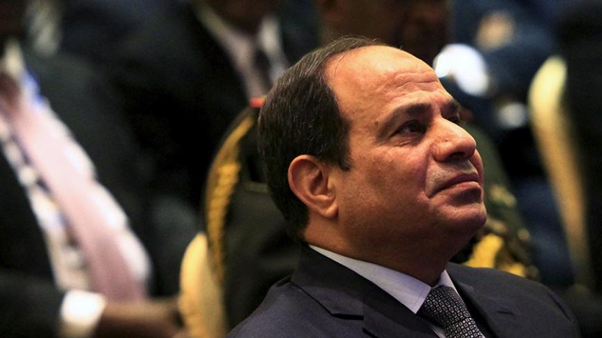 Egypt's President Abdel Fattah al-sisi attends a signing ceremony for the Agreement on the Declaration of Principles on the Grand Ethiopian Renaissance Dam Project in Khartoum March 23, 2015.   REUTERS/ Mohamed Nureldin Abdallah - RTR4UIKO