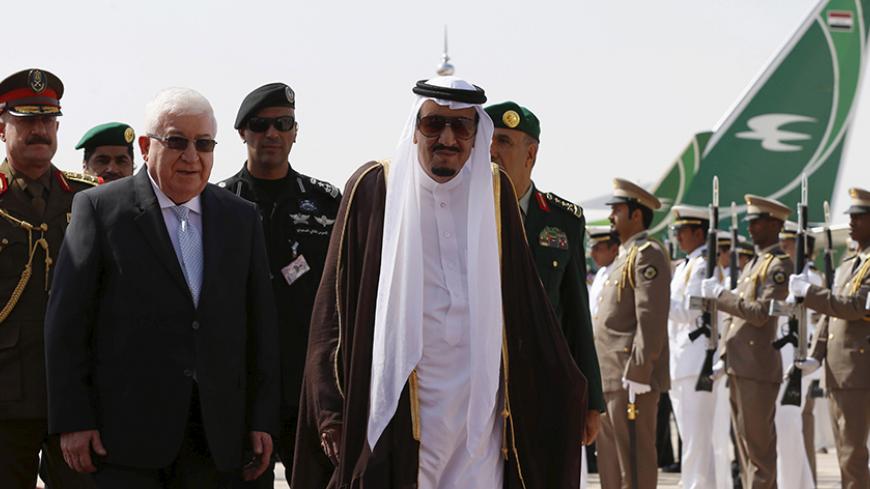 Saudi King Salman bin Abdulaziz (R) walks with Iraq's President Fuad Masum during a welcoming ceremony upon Masum's arrival to attend the Summit of South American-Arab Countries, in Riyadh November 10, 2015. REUTERS/Faisal Al Nasser - RTS6BLS