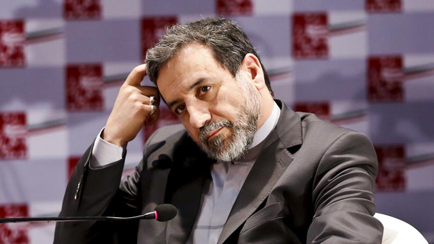 Iran's chief nuclear negotiator Abbas Araghchi attends a nuclear deal review meeting in Tehran August 9, 2015. Dozens of companies tied to Iran's elite Revolutionary Guards, a military force commanding a powerful industrial empire with huge political influence, will win sanctions relief under a nuclear deal agreed with world powers. REUTERS/Raheb Homavandi/TIMA ATTENTION EDITORS - THIS PICTURE WAS PROVIDED BY A THIRD PARTY. REUTERS IS UNABLE TO INDEPENDENTLY VERIFY THE AUTHENTICITY, CONTENT, LOCATION OR DAT