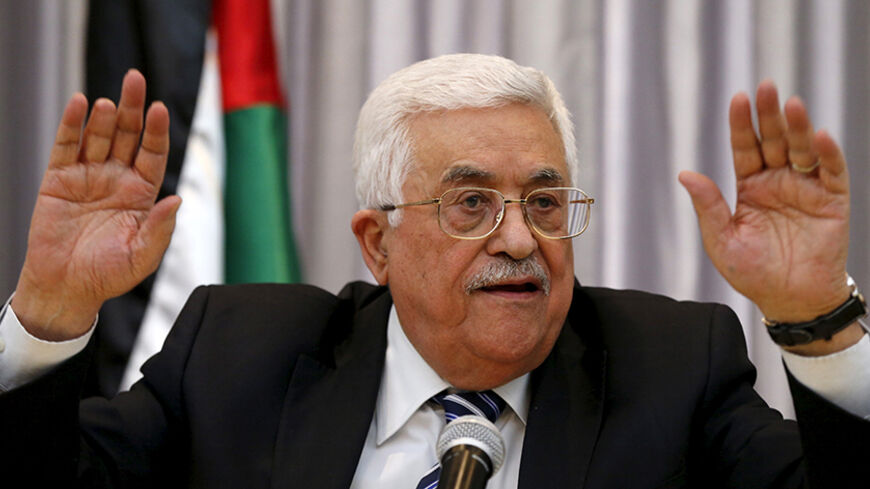 Palestinian President Mahmoud Abbas gestures as he delivers a speech in the West Bank city of Bethlehem January 6, 2016. REUTERS/Ammar Awad  - RTX21A6C