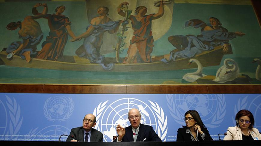 U.N. mediator for Syria Staffan de Mistura (2L) and his staff attend a news conference at the United Nations in Geneva, Switzerland January 25, 2016. REUTERS/Denis Balibouse - RTX23X47